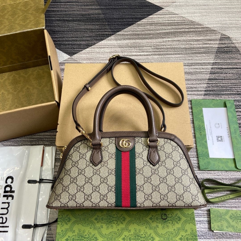 G*u*i top handle bags